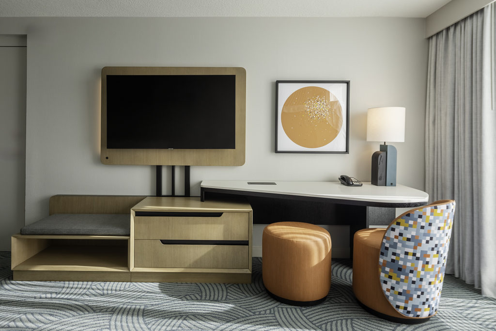 TV and desk in guest room at Hotel Landy in Orlando, Florida