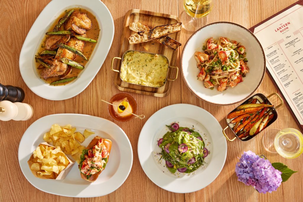 Flat lay of food and drinks at The Lantern Room, part of Streetscape at Sea Crest Beach Resort in Cape Cod